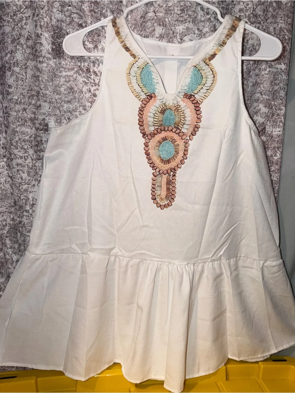 White Embroidered Sleeveless Peplum Dress
